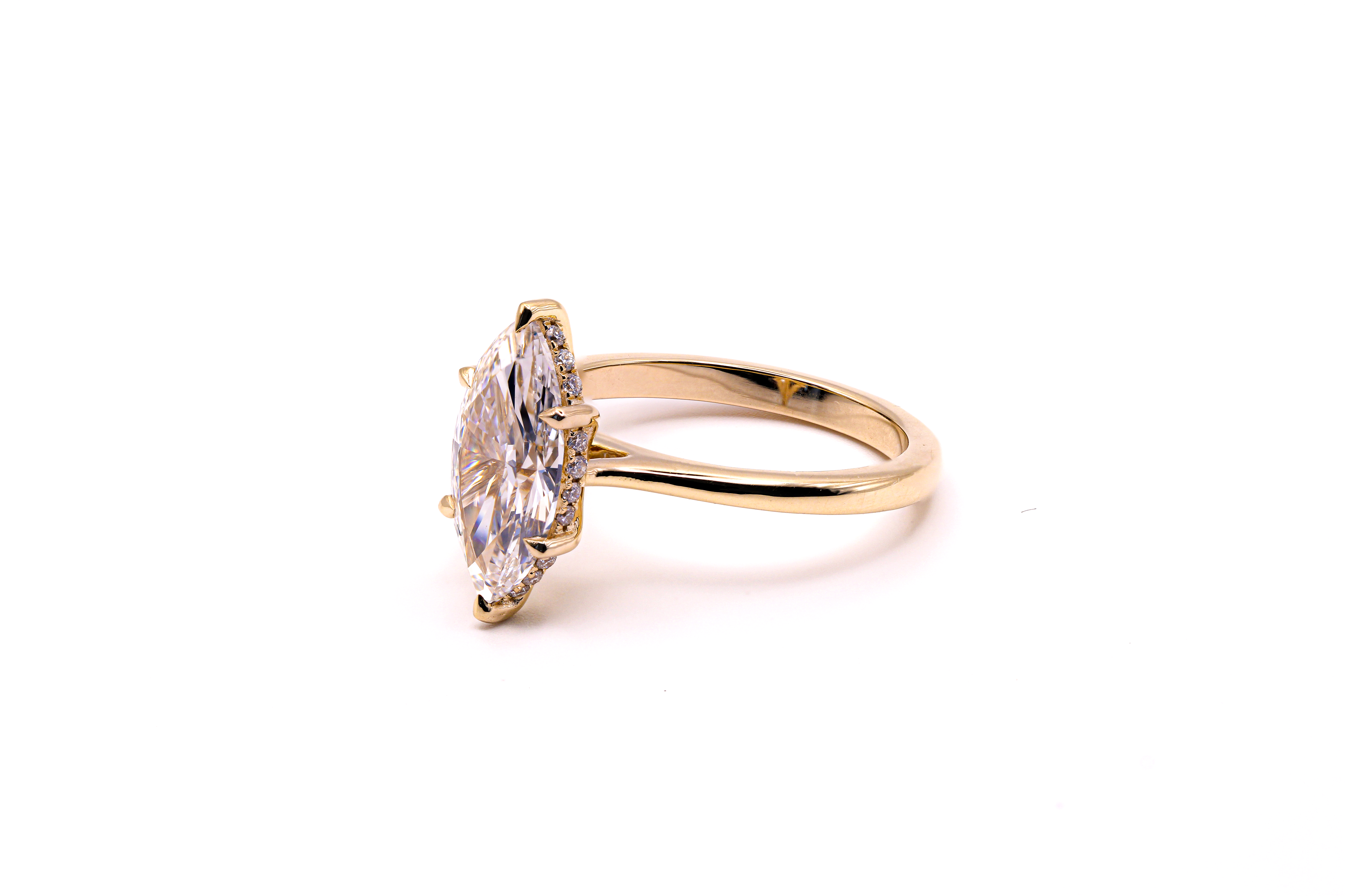 Marquise hidden halo engagement ring